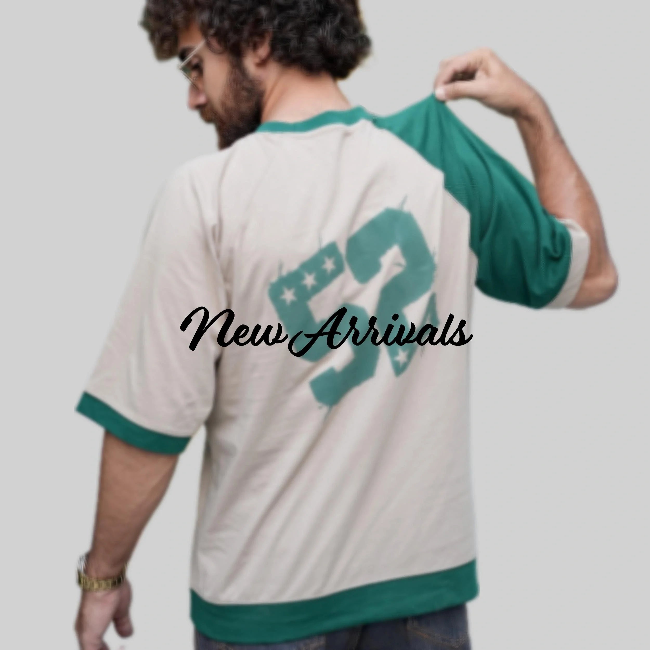 Men New Arrival collection showcasing a stylish hoodie with a motivational print on the back