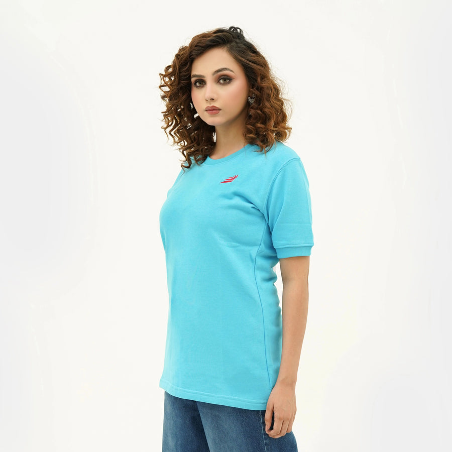 BSG Women's Boldly Born Blue Brilliance Tee Shirt in light blue with a comfortable fit