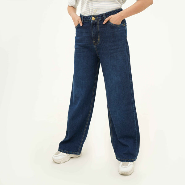 BSG women's Indigo Blue Wide Leg Jeans styled with casual white sneakers and a striped top