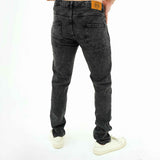 BSG men's denim jeans in black showing back pockets and leather patch featuring modern minimalist black jeans style