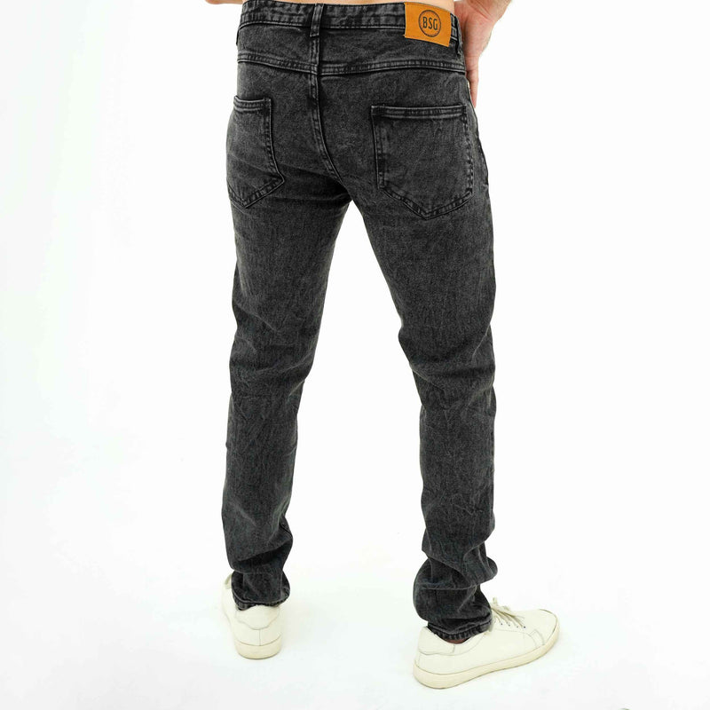 BSG men's denim jeans in black showing back pockets and leather patch featuring modern minimalist black jeans style