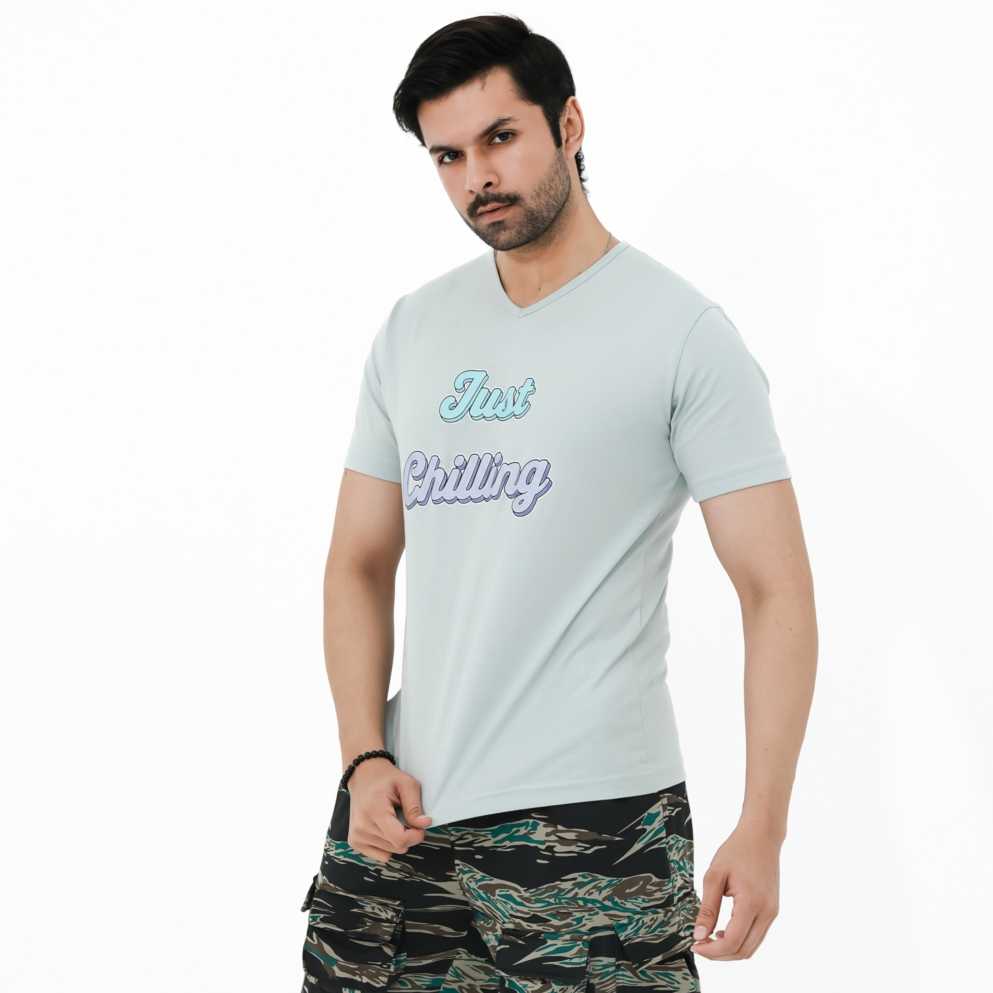 Men's Chill Relaxation V-Neck Tee in light blue, featuring a stylish 'Just Chilling' print