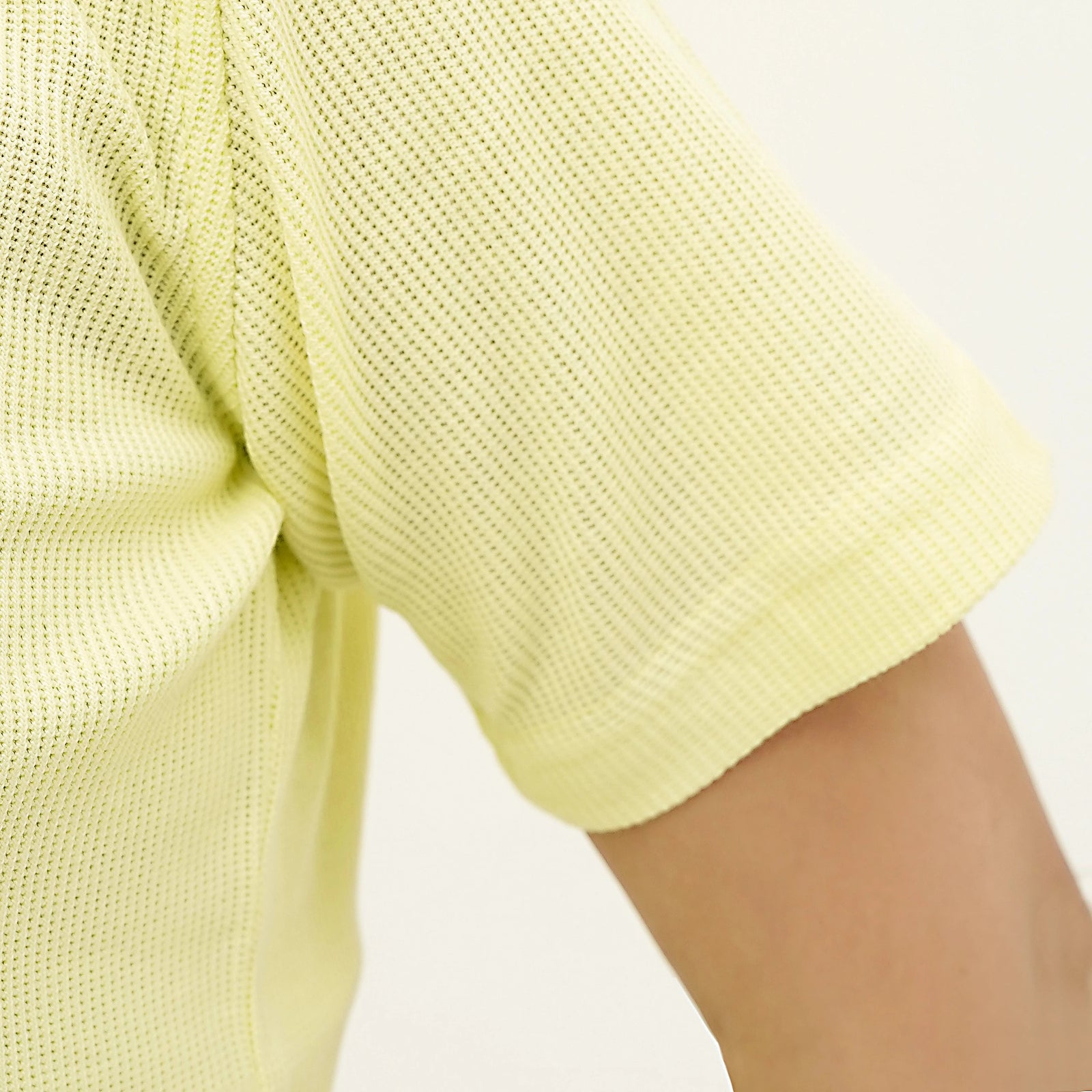 Close-up of the Citrus Weave Breeze Tee Shirt showing breathable fabric and comfortable fit