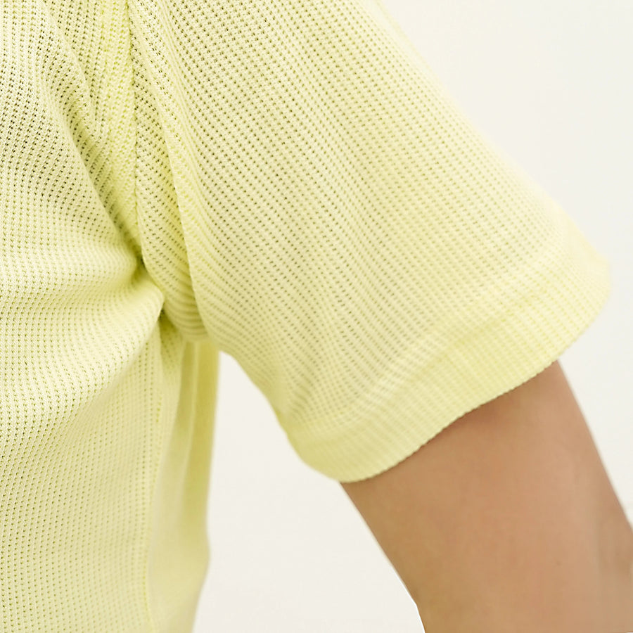 Close-up of the Citrus Weave Breeze Tee Shirt showing breathable fabric and comfortable fit