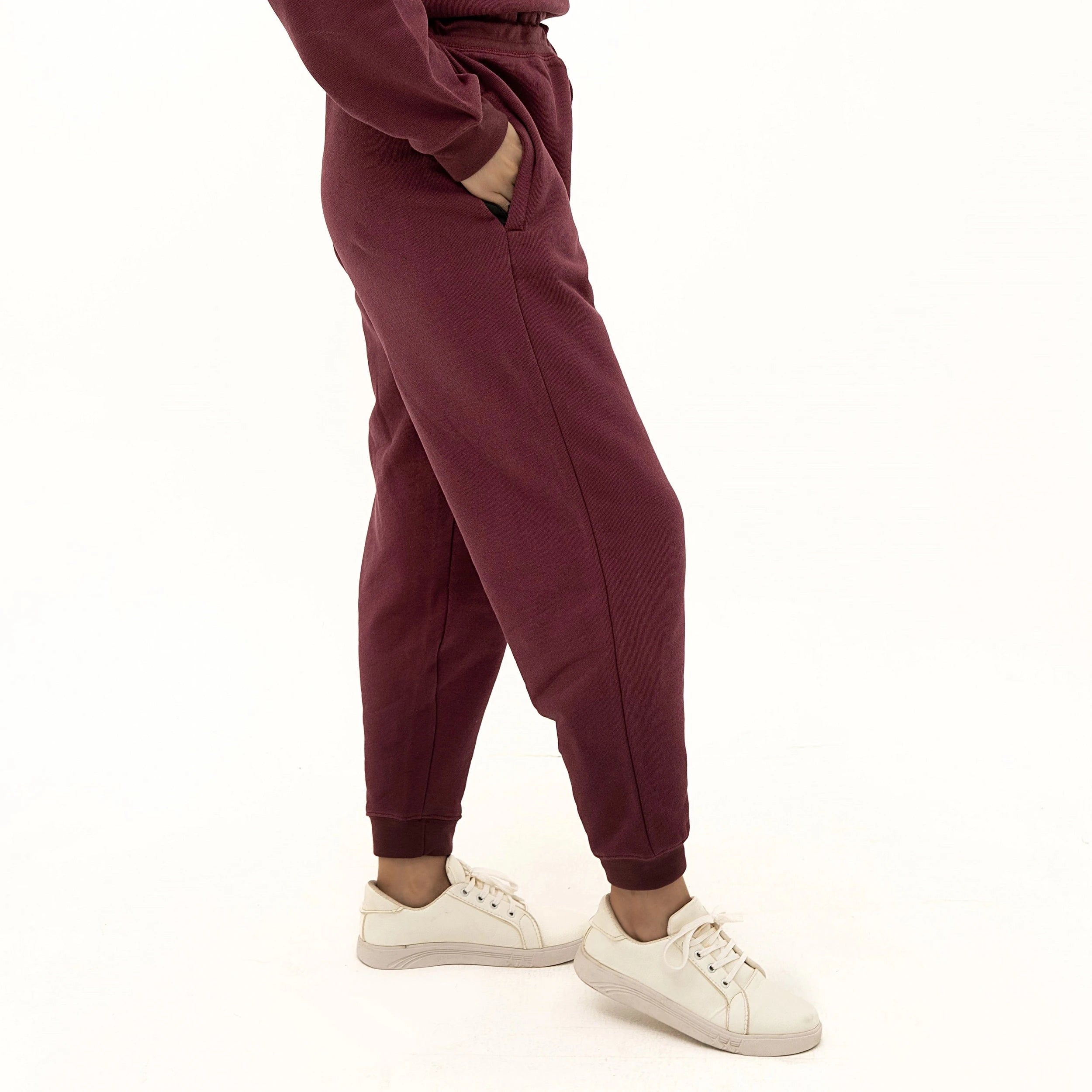 Model wearing Cozy Soft Touch Maroon Sweatpants with side pockets and comfortable fit for casual outings