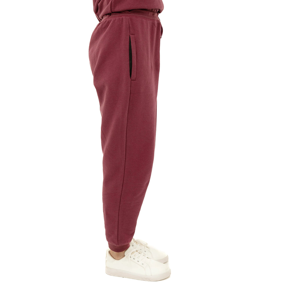 Side view of Cozy Soft Touch Maroon Sweatpants with side pockets and elastic waistband