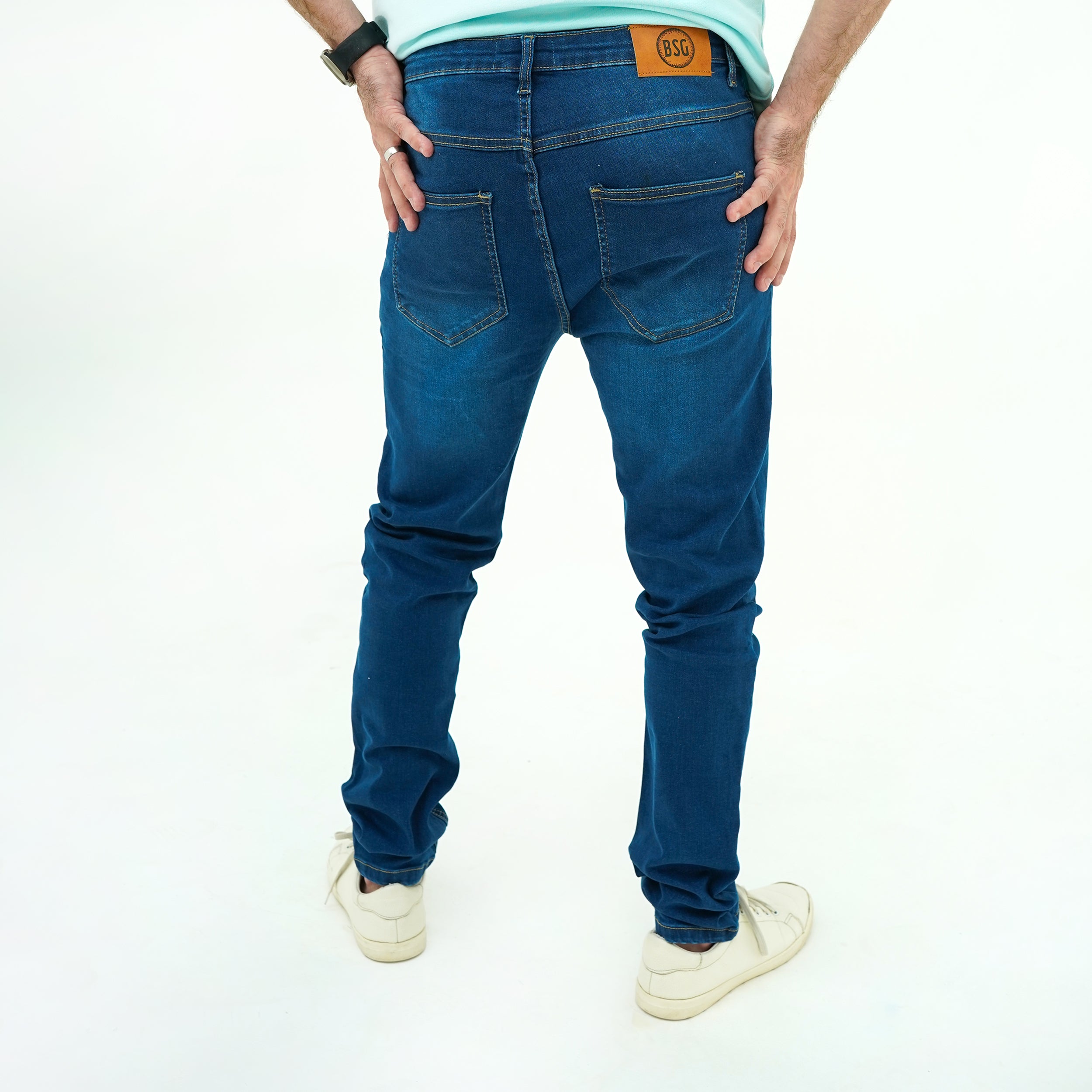 Men's BSG Deep Indigo Slim-Fit Jeans featuring a stylish back pocket design