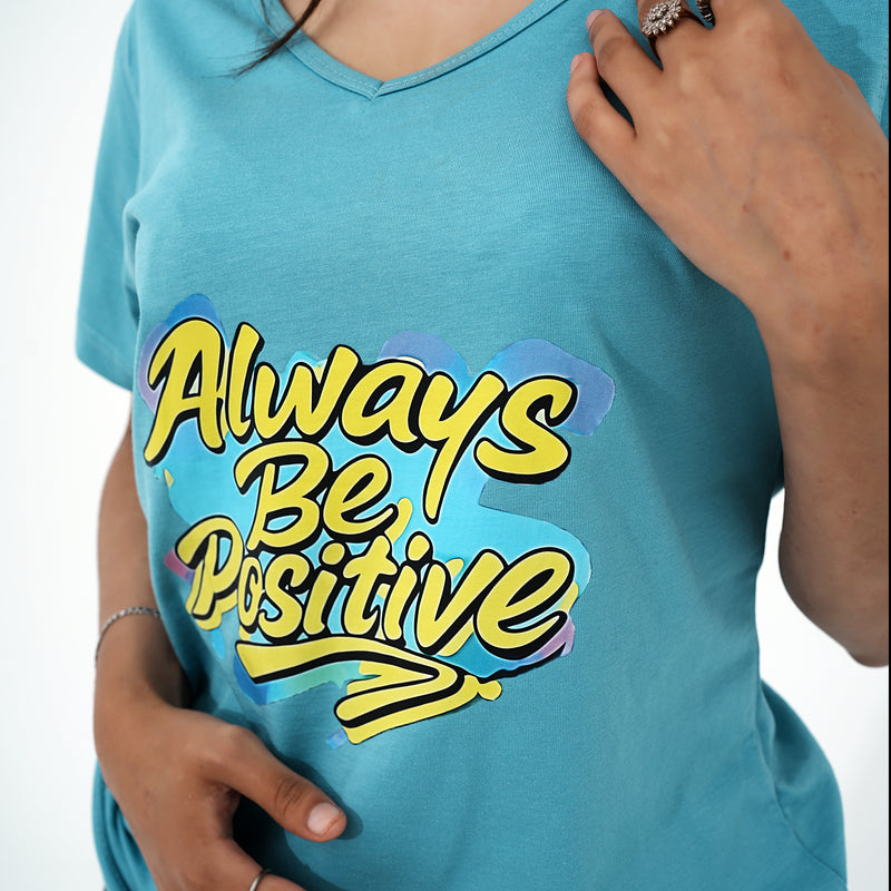 BSG positivity v-neck shirt in blue with 'Always Be Positive' graphic design