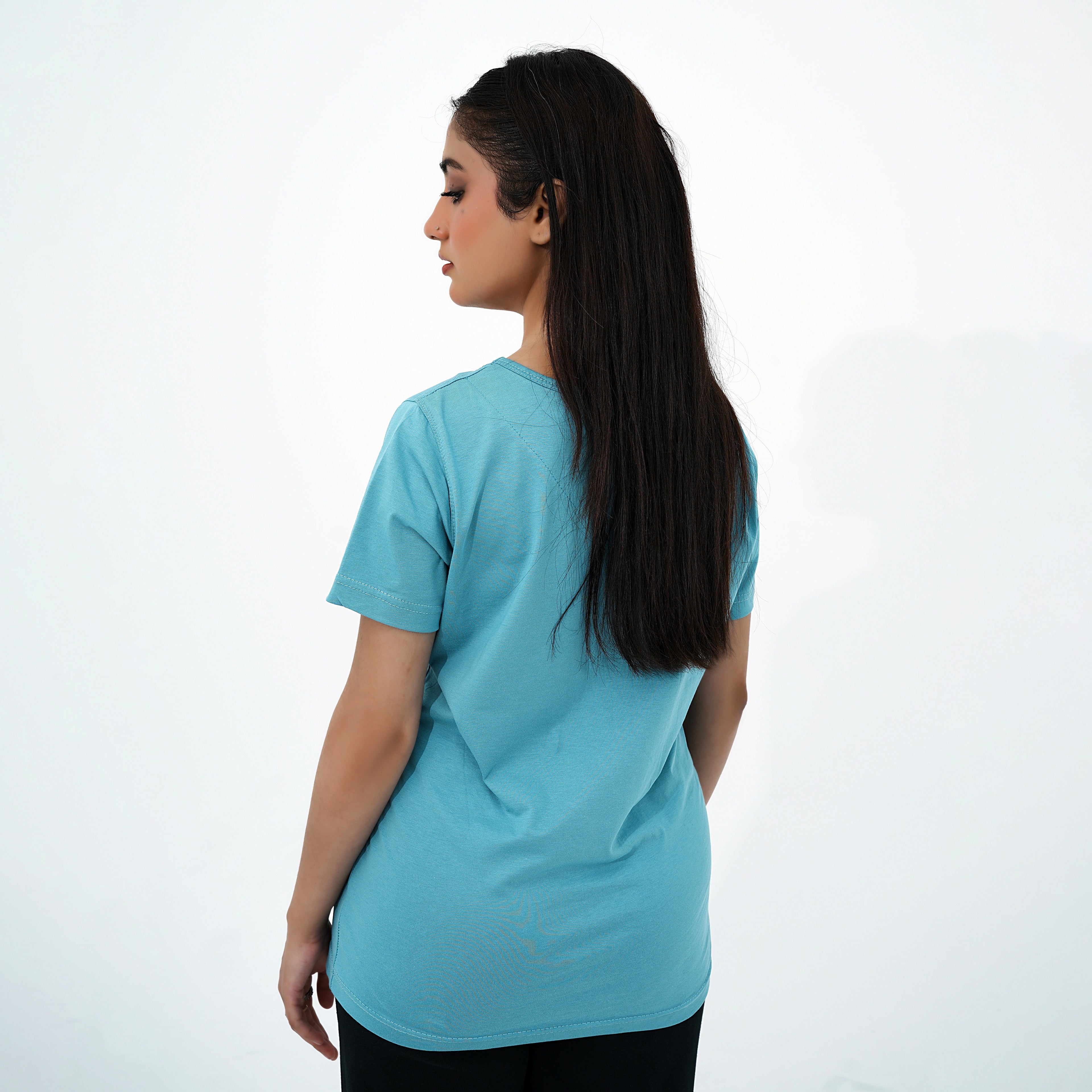 Back view of a light blue women's positivity v-neck shirt by BSG for casual and comfortable wear
