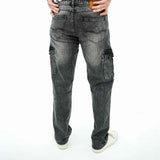 BSG men's rugged multi-pocket cargo denim jeans in faded black shown from the back