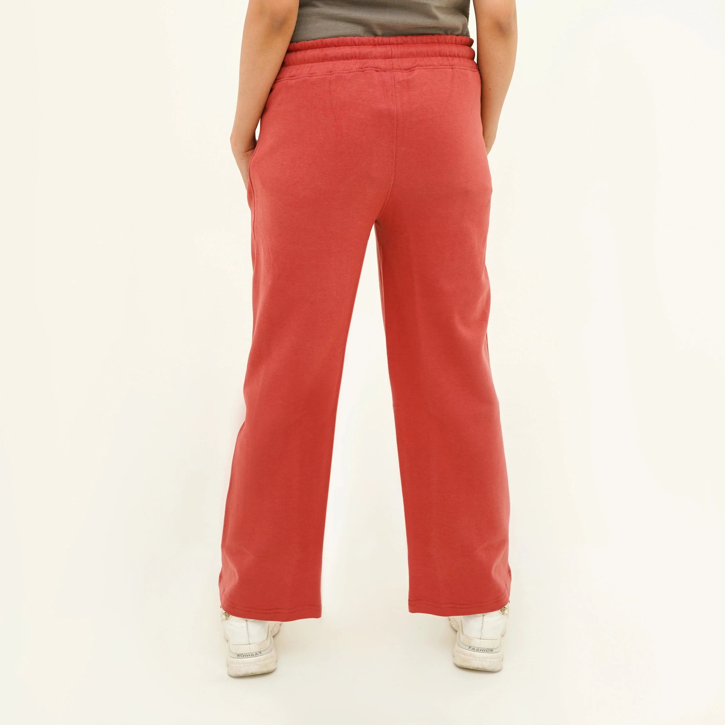Back view of Soft Carrot Chic Breeze Pants for women, featuring a comfortable fit and stylish design.