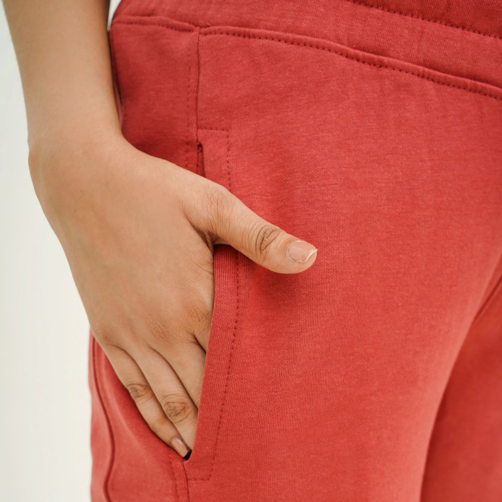 Close-up of BSG Soft Carrot Chic Breeze Pants featuring a side pocket for casual comfort