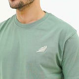 Men's BSG Verdant Charm Pistachio Luxe Tee Shirt in soft pistachio green with embroidered logo