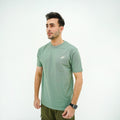 Men's Verdant Charm Pistachio Luxe Tee Shirt in soft green with a stylish design