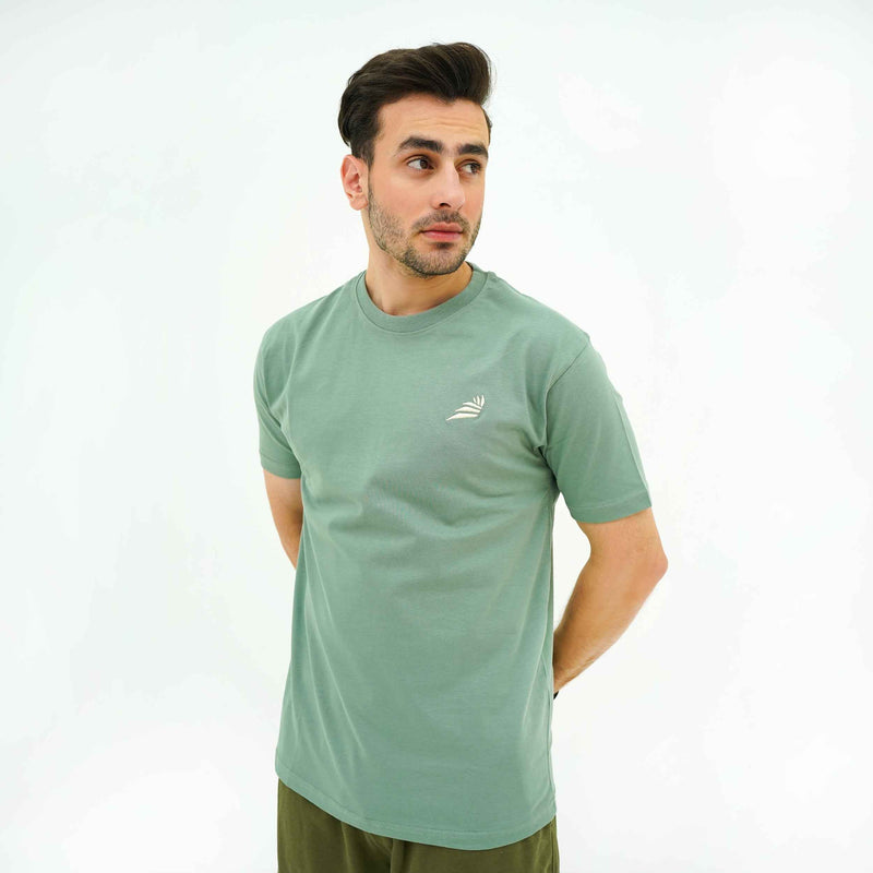BSG men's Verdant Charm Pistachio Luxe Tee Shirt in pistachio green with short sleeves and logo detail
